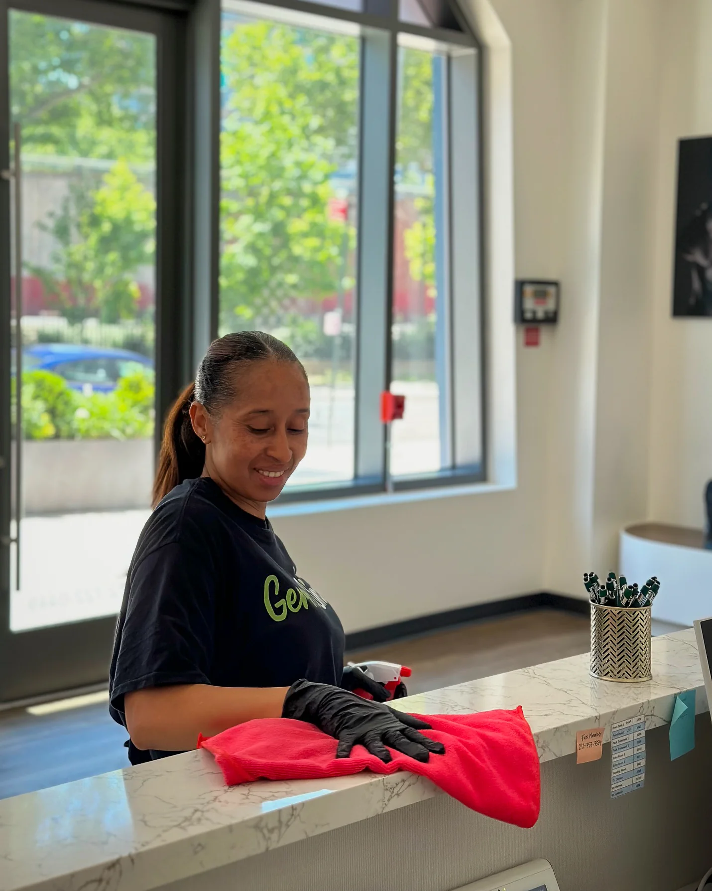 Commercial cleaning team reviewing a building scope in a modern office